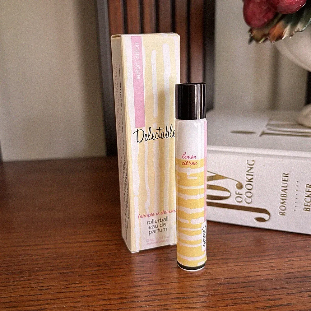 Delectable Rollerball Lemon Scent Travel / Purse .34 fl oz Cake Beauty